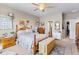 Spacious bedroom with a queen-size bed, ample natural light and lots of closet space at 115 Holly Leaf Ln, Summerville, SC 29486