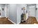 Bright entryway with light gray walls and wood flooring at 115 Holly Leaf Ln, Summerville, SC 29486