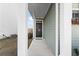 Inviting front entry with covered walkway and modern door at 115 Holly Leaf Ln, Summerville, SC 29486