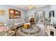 Cozy living room with a comfortable sofa, coffee table, and access to a patio at 115 Holly Leaf Ln, Summerville, SC 29486