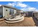 Circular patio with seating area and adjacent screened porch at 115 Holly Leaf Ln, Summerville, SC 29486