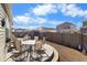 Backyard patio with seating for six, and a partially covered screened porch at 115 Holly Leaf Ln, Summerville, SC 29486