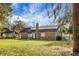 Brick house with a large backyard and oak trees at 1219 Edward Dr, Moncks Corner, SC 29461