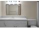 Bathroom with white vanity, toilet, and shower/tub combo at 1219 Edward Dr, Moncks Corner, SC 29461
