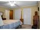 Spacious bedroom with ample closet space and neutral wall colors at 1219 Edward Dr, Moncks Corner, SC 29461