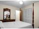 Bedroom with four-poster bed, dresser and private closet at 1219 Edward Dr, Moncks Corner, SC 29461