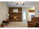 Living room with brick fireplace and wood mantel at 1219 Edward Dr, Moncks Corner, SC 29461