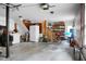 Spacious garage with ample storage shelving and a workbench at 1219 Edward Dr, Moncks Corner, SC 29461