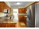 Kitchen features wood cabinets, stainless steel appliances, and a breakfast nook at 1219 Edward Dr, Moncks Corner, SC 29461