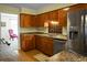 Kitchen with wood cabinets, stainless steel appliances and granite countertops at 1219 Edward Dr, Moncks Corner, SC 29461