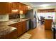 Kitchen with wood cabinets, granite countertops, and stainless steel appliances at 1219 Edward Dr, Moncks Corner, SC 29461