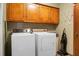 Laundry room with washer, dryer, and built-in cabinets at 1219 Edward Dr, Moncks Corner, SC 29461