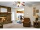 Open living room with fireplace and view to dining area at 1219 Edward Dr, Moncks Corner, SC 29461