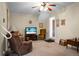Relaxing living room with recliner and TV at 1219 Edward Dr, Moncks Corner, SC 29461