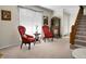 Spacious living room with antique chairs and a view of the staircase at 1219 Edward Dr, Moncks Corner, SC 29461