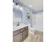 Bathroom with a white tub and shower, and dark brown vanity at 155 Surfbird Rd, Summerville, SC 29486
