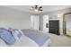 Bright bedroom with king bed, dresser, and access to bathroom at 155 Surfbird Rd, Summerville, SC 29486