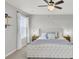 Spacious bedroom with king-size bed, neutral walls, and natural light at 155 Surfbird Rd, Summerville, SC 29486