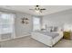 Main bedroom with tufted headboard and neutral decor at 155 Surfbird Rd, Summerville, SC 29486