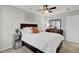 Bedroom with a dark brown bed frame and white bedding and a ceiling fan at 155 Surfbird Rd, Summerville, SC 29486