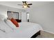 Bedroom with a dark brown bed frame and white bedding, and a ceiling fan at 155 Surfbird Rd, Summerville, SC 29486