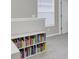 Built-in bookshelves filled with books line the wall at 155 Surfbird Rd, Summerville, SC 29486