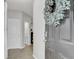 Inviting entryway with a grey door and a view of the bathroom at 155 Surfbird Rd, Summerville, SC 29486