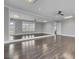 A fitness studio with large mirrors, wood floors, and ceiling fans provides space for workouts at 155 Surfbird Rd, Summerville, SC 29486