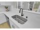 Modern kitchen sink and faucet with white quartz countertops at 155 Surfbird Rd, Summerville, SC 29486