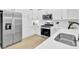 Bright kitchen featuring stainless steel appliances and white shaker cabinets at 155 Surfbird Rd, Summerville, SC 29486