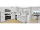 Modern white kitchen with stainless steel appliances at 155 Surfbird Rd, Summerville, SC 29486
