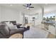 Open concept living room with kitchen view and sectional sofa at 155 Surfbird Rd, Summerville, SC 29486