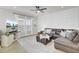 Spacious living room featuring a sectional sofa and large TV at 155 Surfbird Rd, Summerville, SC 29486