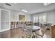 Well-lit meeting room with round tables and comfortable seating, ideal for gatherings and socializing at 155 Surfbird Rd, Summerville, SC 29486