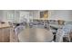 Large meeting room featuring round tables, wood floors and decorative art, perfect for events at 155 Surfbird Rd, Summerville, SC 29486