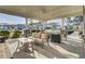 Covered patio with comfortable seating, perfect for relaxing and entertaining guests at 155 Surfbird Rd, Summerville, SC 29486