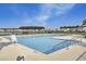 Community pool with clearly marked lanes and plenty of seating for residents to enjoy at 155 Surfbird Rd, Summerville, SC 29486