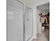 Clean walk-in shower with glass enclosure and adjacent closet at 155 Surfbird Rd, Summerville, SC 29486