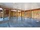 Unfinished basement with concrete floor and wooden supports at 1681 E Ashley Ave # A & B, Folly Beach, SC 29439