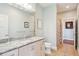 Bathroom with granite countertop, tiled floors, and a shower at 1681 E Ashley Ave # A & B, Folly Beach, SC 29439