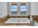 Relaxing bathroom with soaking tub and ocean views at 1681 E Ashley Ave # A & B, Folly Beach, SC 29439