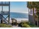 Beach access staircase from elevated home at 1681 E Ashley Ave # A & B, Folly Beach, SC 29439