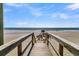 Wooden walkway to beach with ocean view at 1681 E Ashley Ave # A & B, Folly Beach, SC 29439