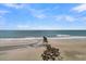 Long beach with rocks and blue water at 1681 E Ashley Ave # A & B, Folly Beach, SC 29439
