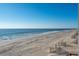 Expansive beach view with clear water and sandy shoreline at 1681 E Ashley Ave # A & B, Folly Beach, SC 29439