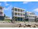 Beachfront property with stairs leading to the sand at 1681 E Ashley Ave # A & B, Folly Beach, SC 29439