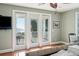 Bedroom with ocean views and private balcony access at 1681 E Ashley Ave # A & B, Folly Beach, SC 29439