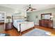 Main bedroom with king-size bed and ensuite bathroom at 1681 E Ashley Ave # A & B, Folly Beach, SC 29439