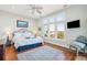 Bedroom with water views and a sitting area at 1681 E Ashley Ave # A & B, Folly Beach, SC 29439