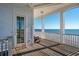 Oceanfront deck with rocking chair and stunning view at 1681 E Ashley Ave # A & B, Folly Beach, SC 29439